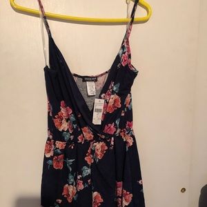 Fashion Nova romper blue w/flowers, size large